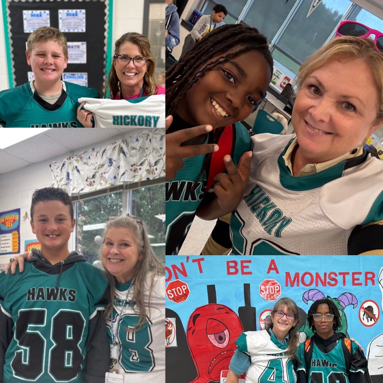 football players giving jersey to educator