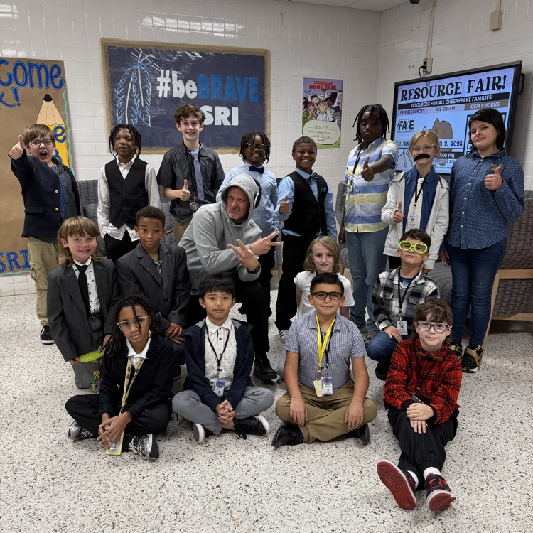 All students dressed as Mr. Triolet and then Triolet dressed as a student