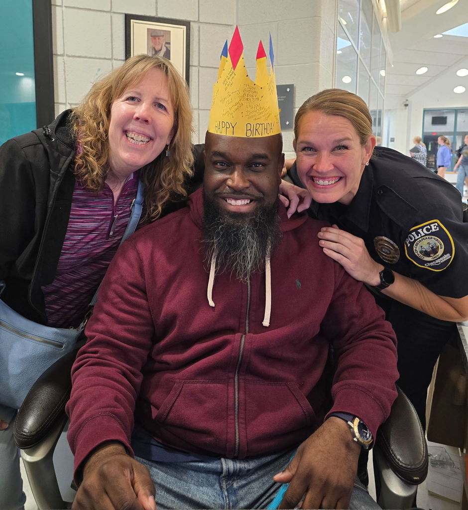 Security guard with Happy Birthday crown