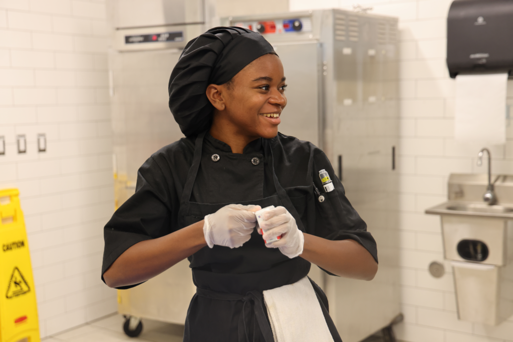student smiling while prepping
