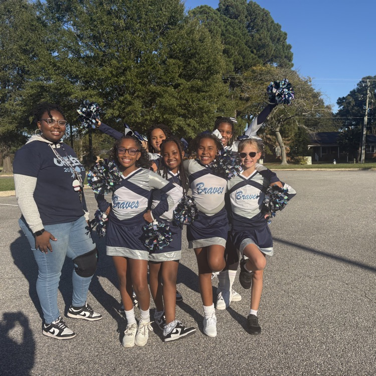 Mrs. Tynes and our Cheerleaders