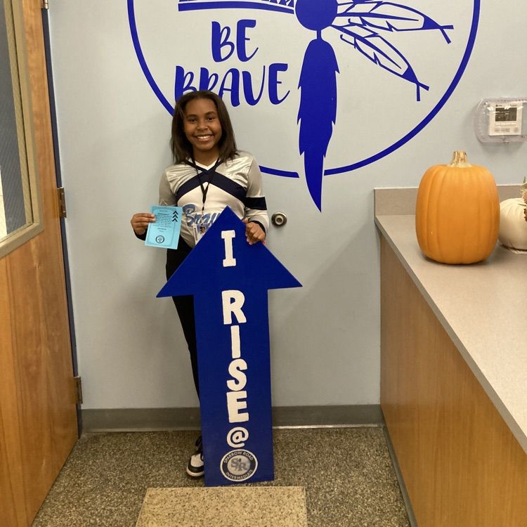 Student with IRISE sign