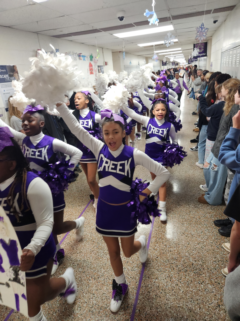 middle school cheerleaders in hall