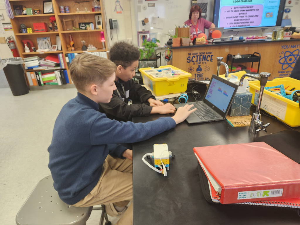 two boys on computer during lego club