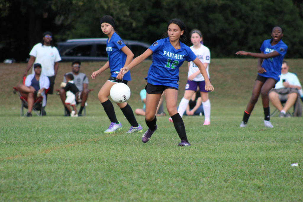 girls on soccer field