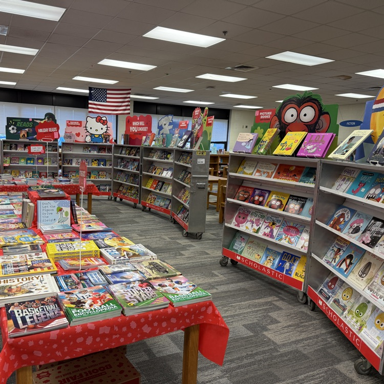 book fair carts and tables with books