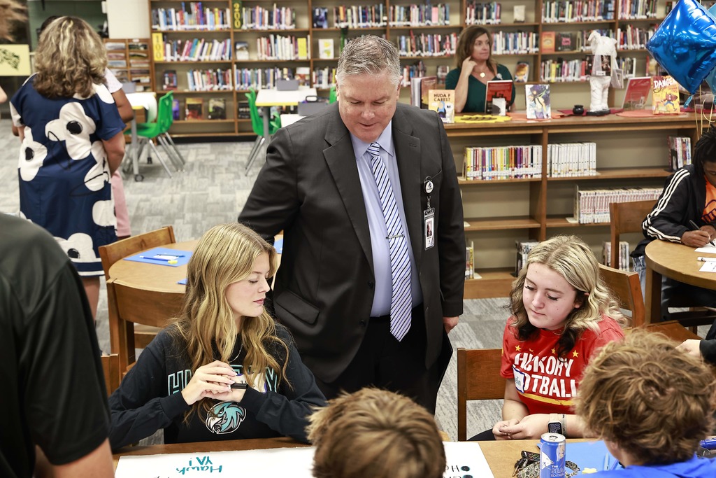 Dr. Cotton talking to high school students