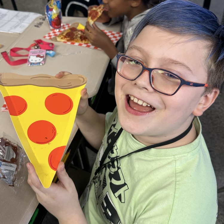 student with pizza plate