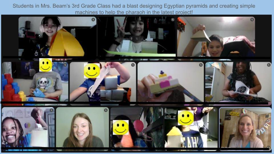 smiling students holding thieir science projects