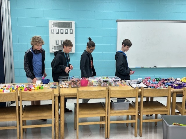 students shopping at school store