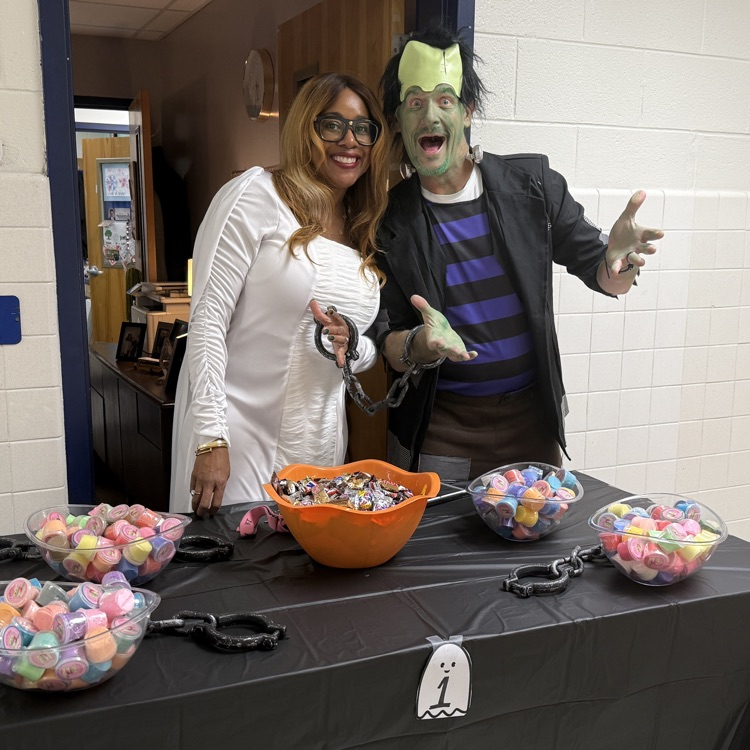 admin dressed as Frankenstein and the Bride of Frankenstein