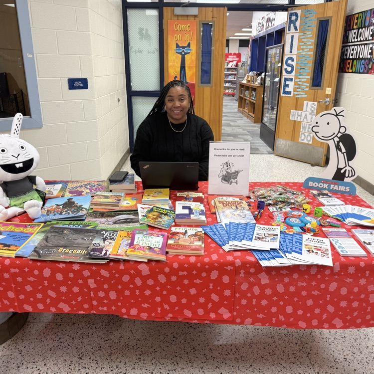 F.A.C.E. table with books to give away 