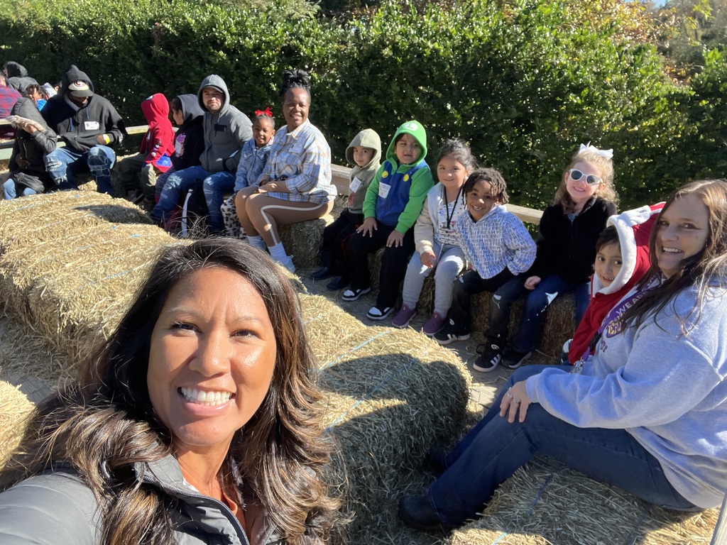 Kindergartners enjoying a hay ride at Hunt Club Farm