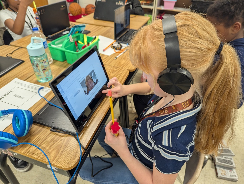 student demonstrating rotation & revolution for a video recording