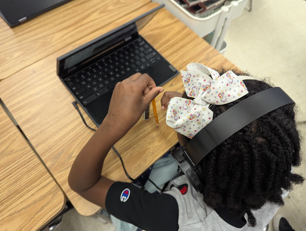 student demonstrating rotation & revolution for a video recording