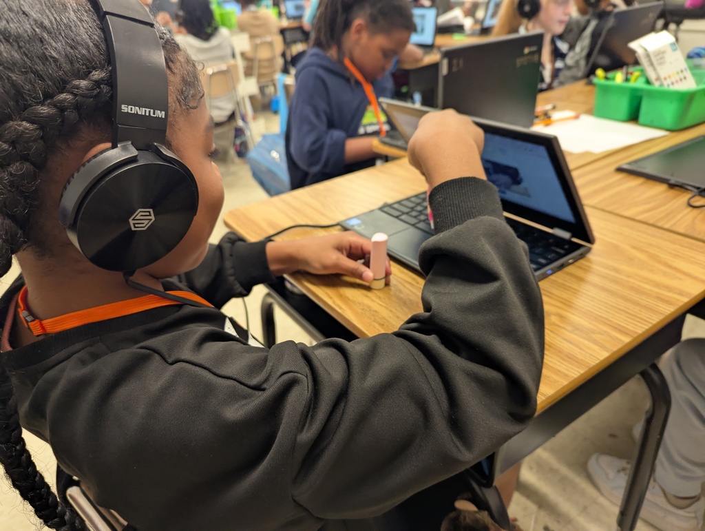 student demonstrating rotation & revolution for a video recording