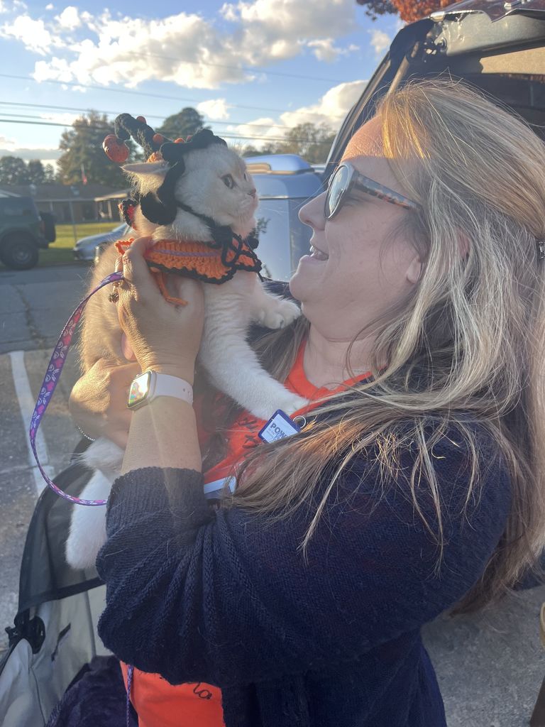 Mrs. Reynold's with her cat as a witch