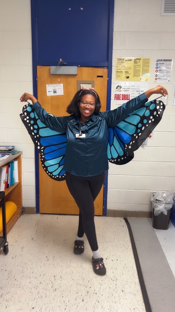Mrs. Monroe dressed as the butterfly from the Hungry Caterpillar