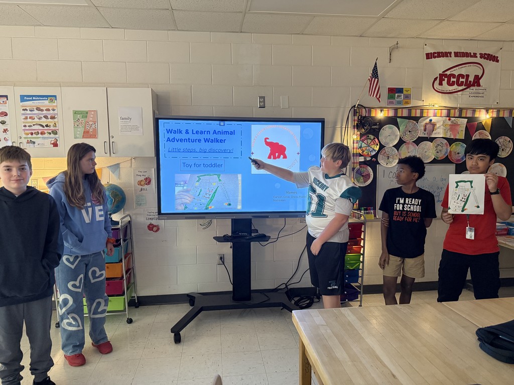 students presenting in a class