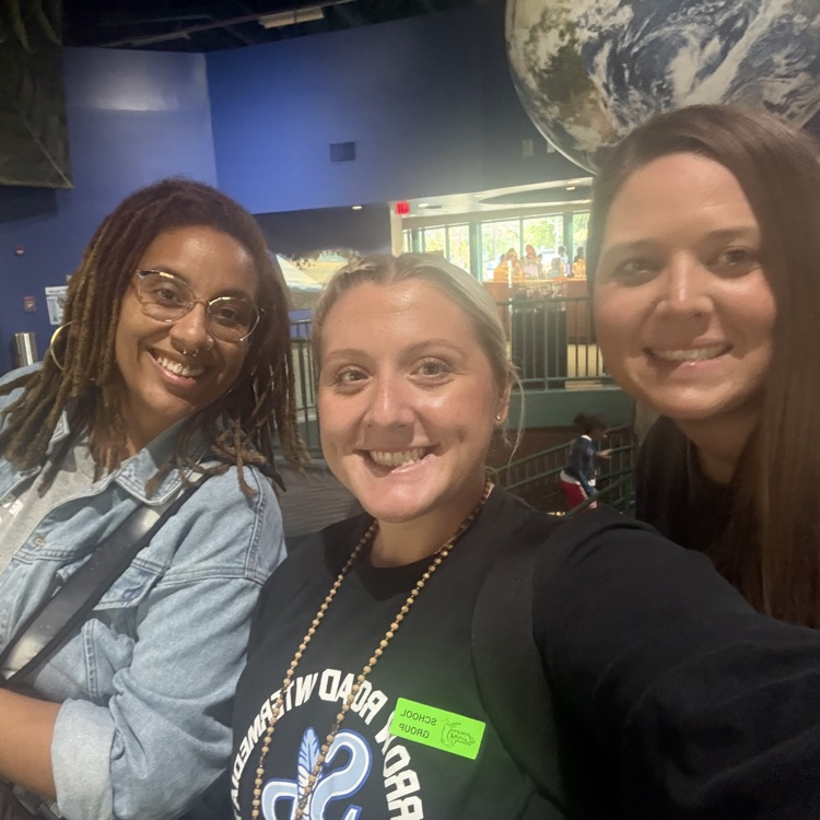 staff smiling: Johnson, Warner, Brittingham 