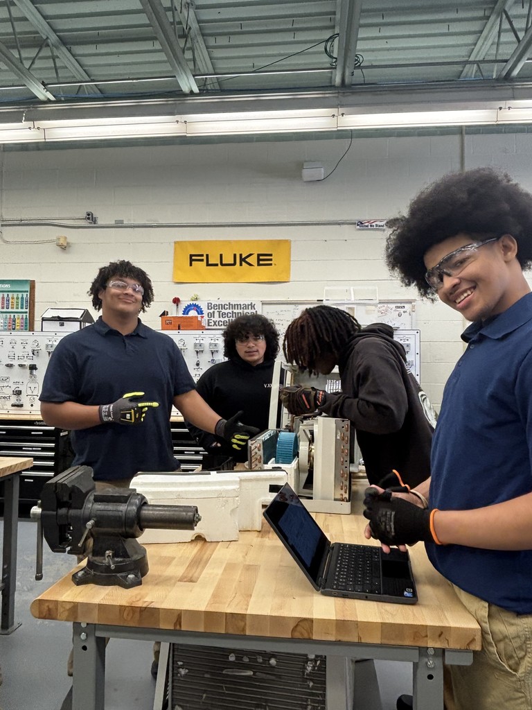 HVAC students fixing mini motor
