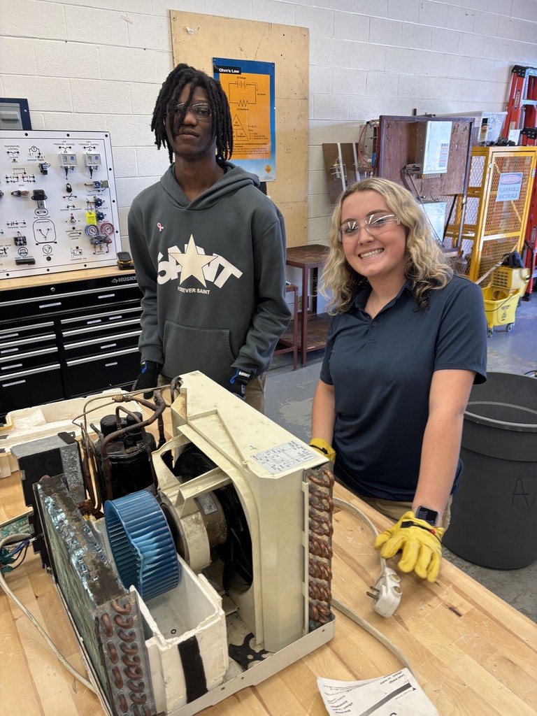 HVAC students fixing mini motor