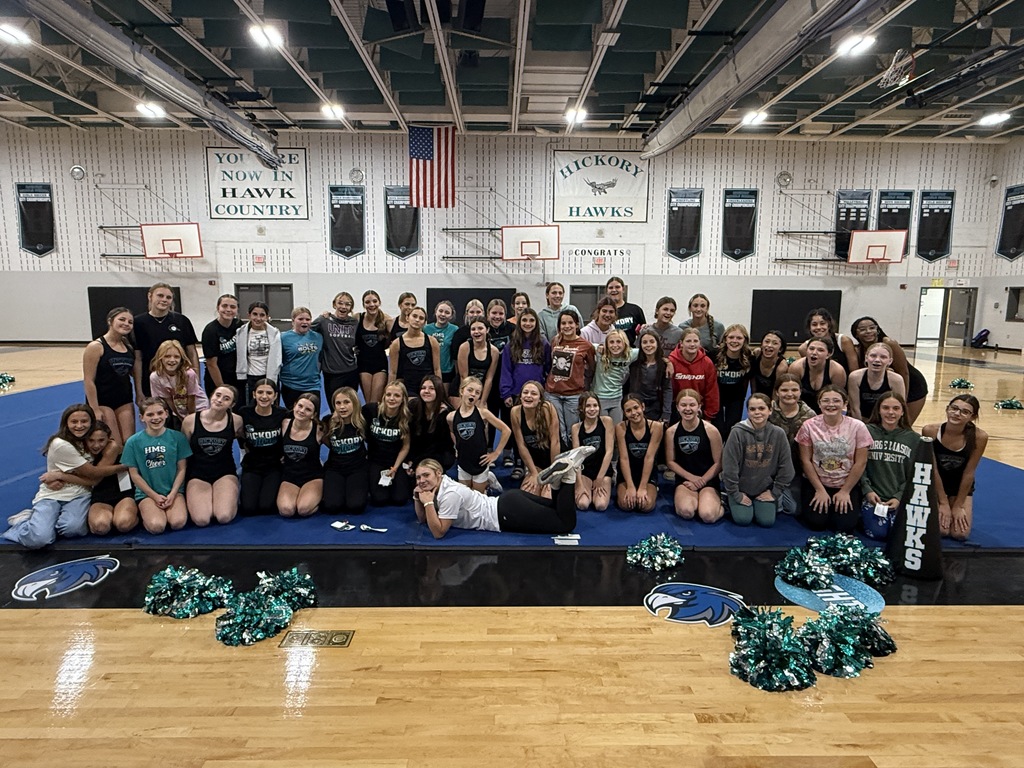 softball and cheerleaders in gymnasium