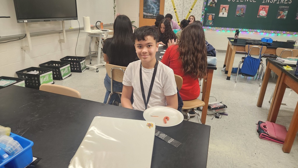 Student in the small craft club smiling