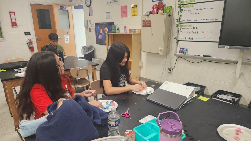 Two girls in the small craft club with play dough