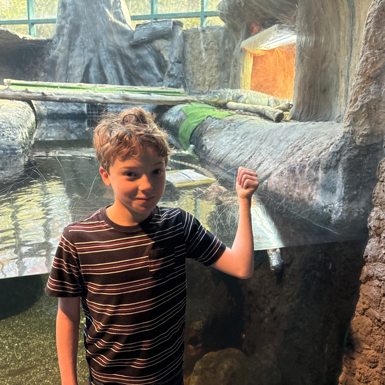 student in front a water exhibit 