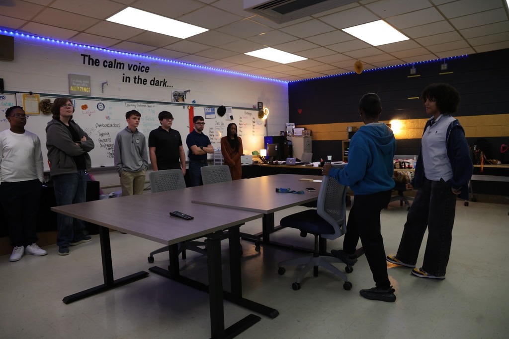 Two students presenting to a group at CCC