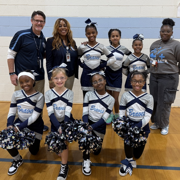 admin, Mrs. Tynes, and cheerleaders 