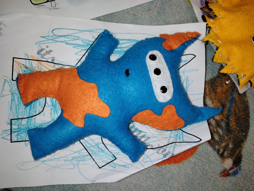 Close up of blue and orange monster
