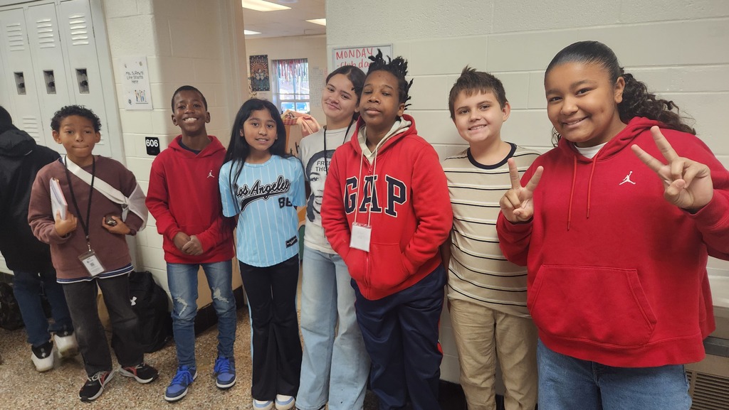 Kids wearing red, and blue, and beige. Military Colors