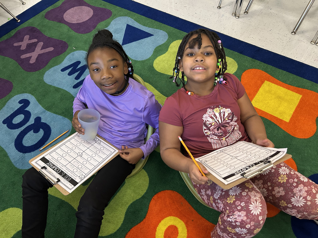 students play roll and compare to practice comparing numbers