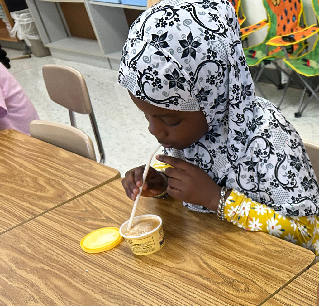 student tastes root beer float to explore states of matter