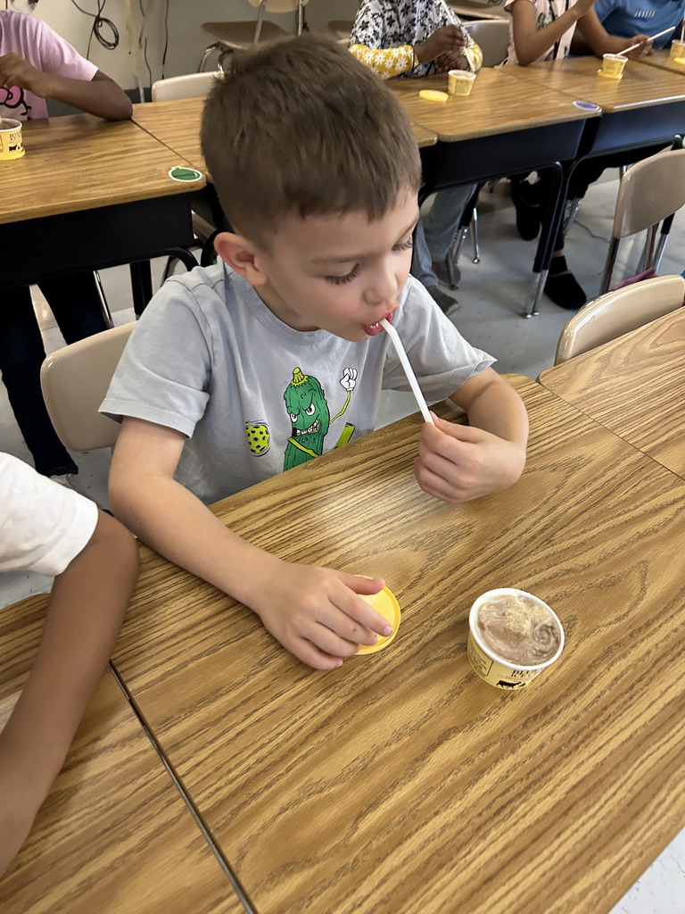 student tastes root beer float to explore states of matter