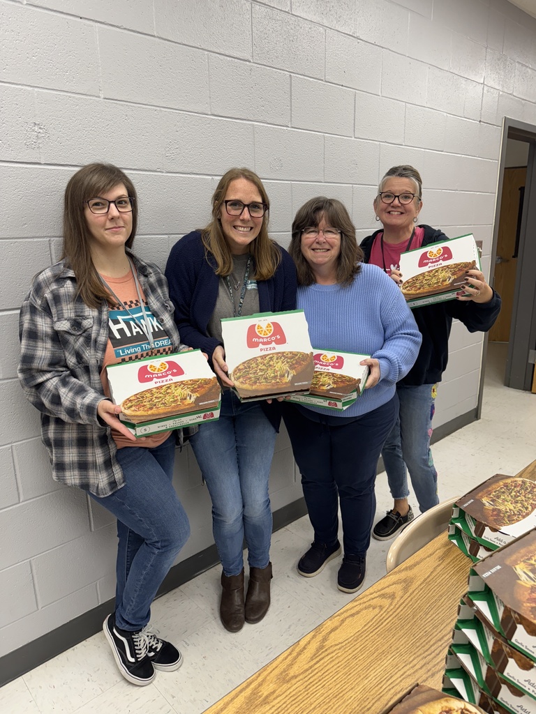 Educators with pizza from Marco's Pizza