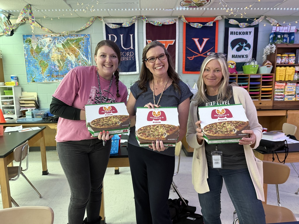 Educators with pizza from Marco's Pizza