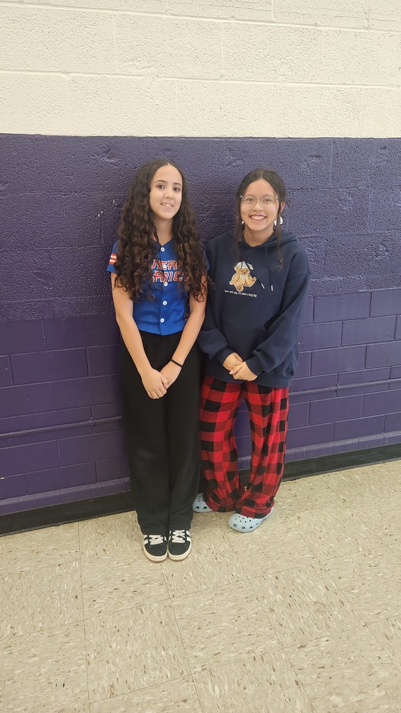 Two girls wearing red, white and blue