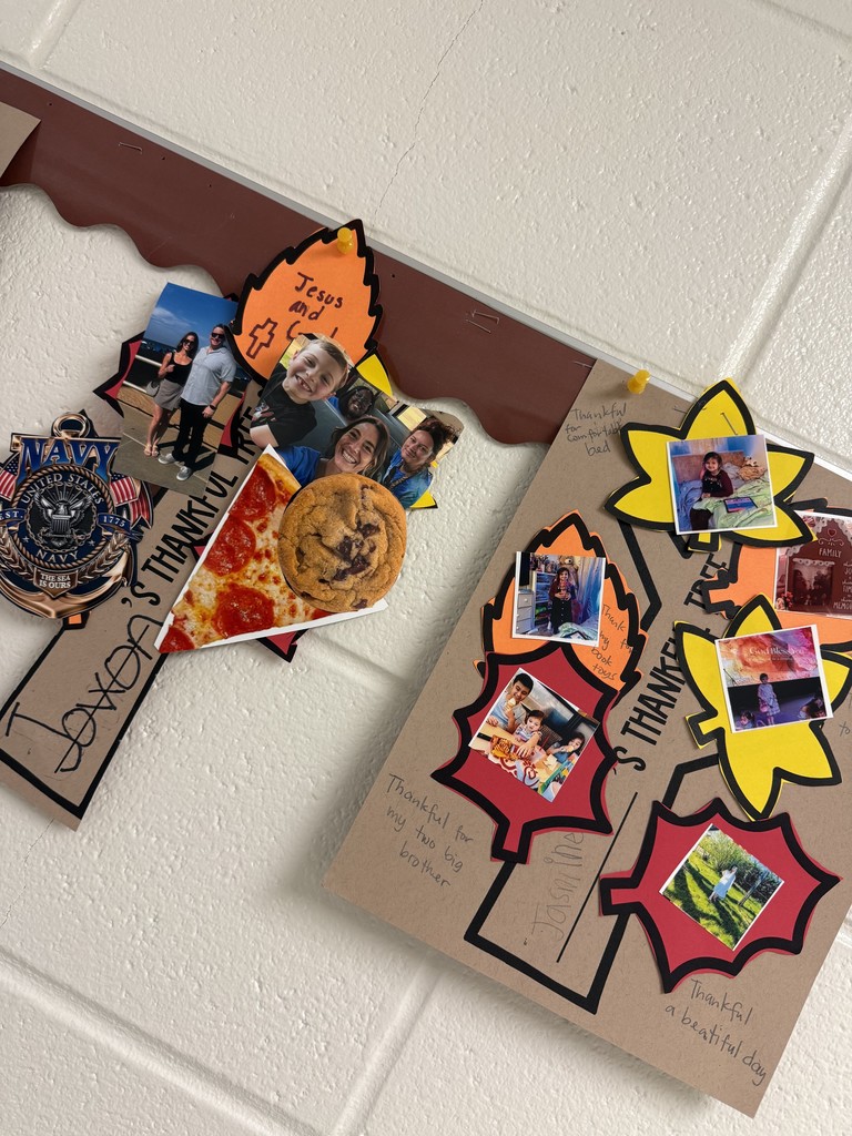 Jaxon and Jasmine's trees of gratitude showing pictures of what they are grateful for