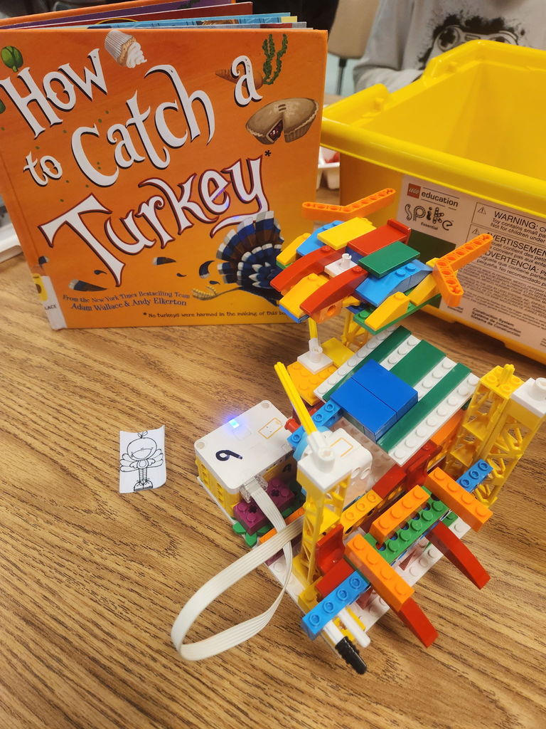 students building with legos