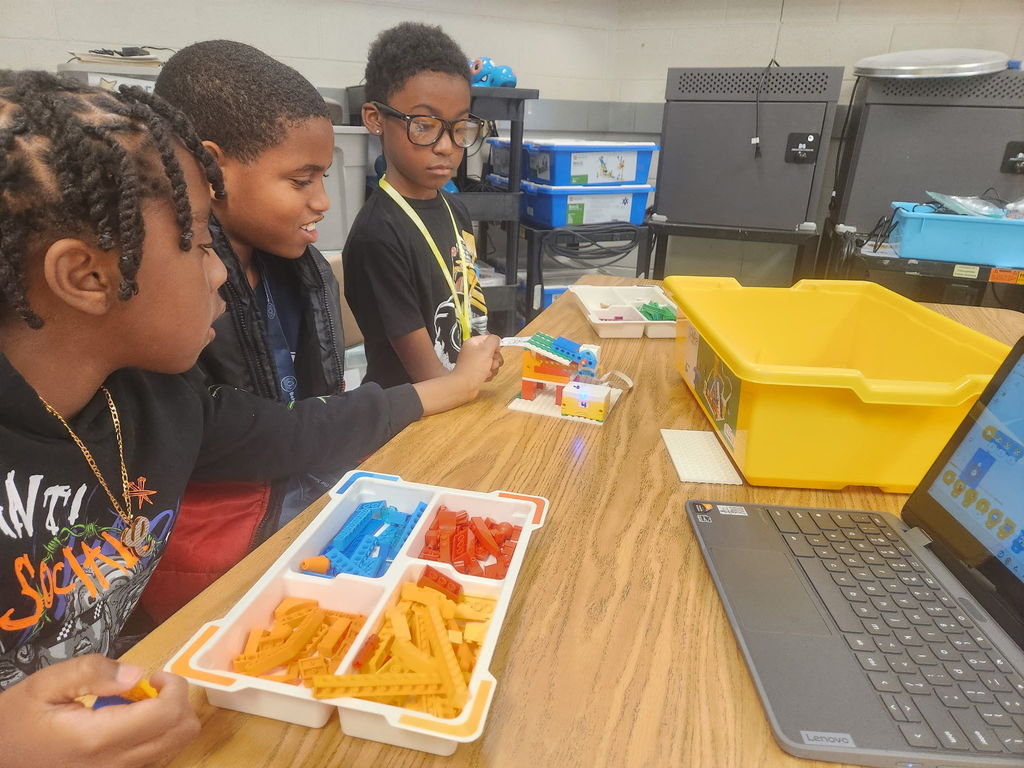 students building with legos
