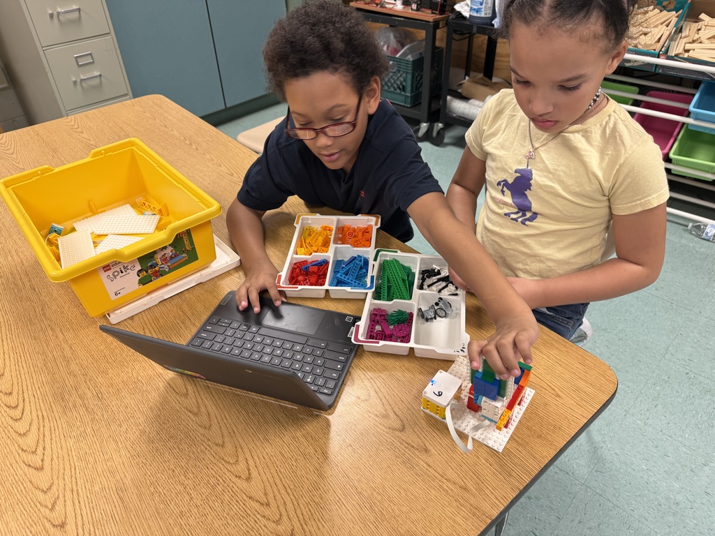students building with legos