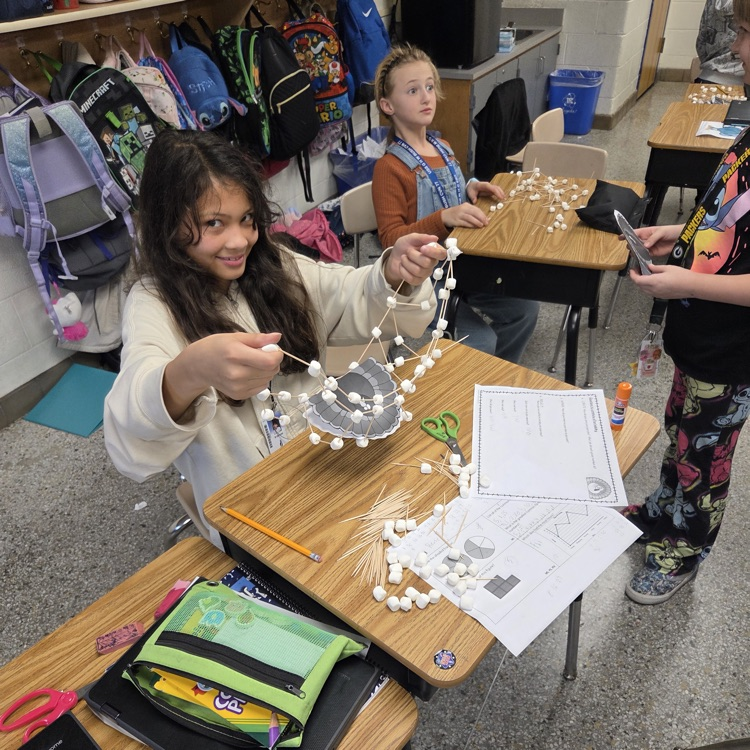 student with turkey cage 