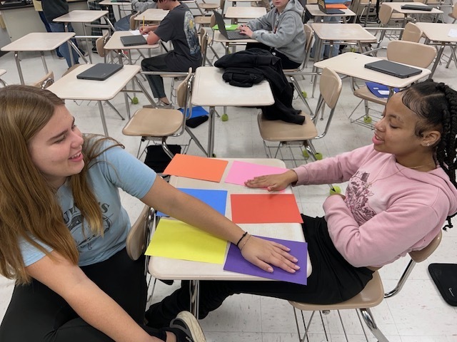 students playing hand eye coordination game