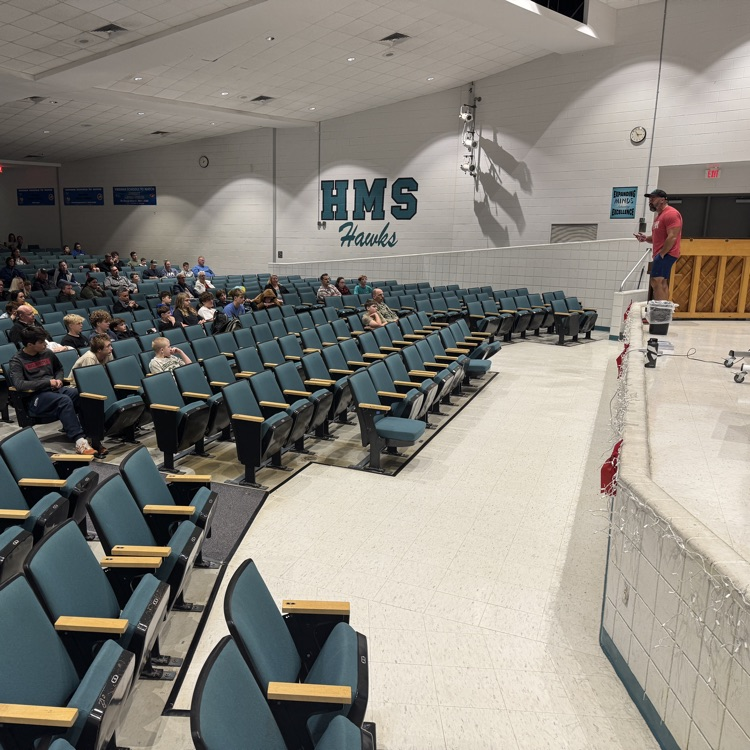 winter coaches and team members with family