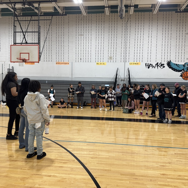 winter coaches and team members with family