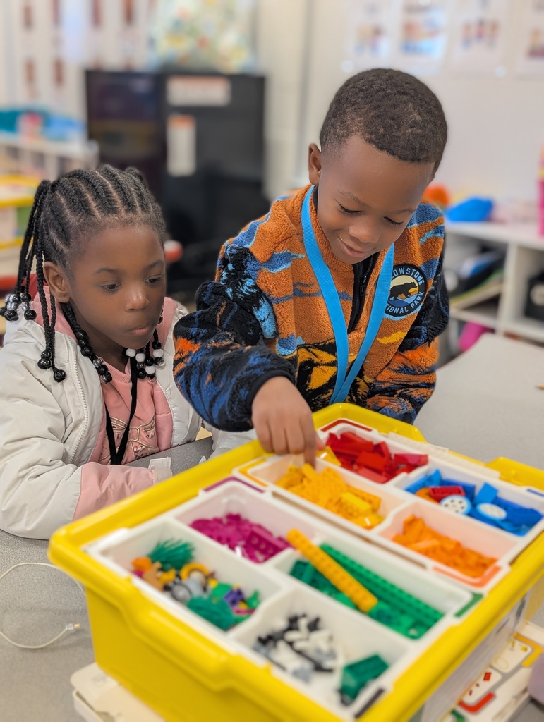 Kindergarten students building a Lego car to measure and then measure the distance it will travel at varying speeds.