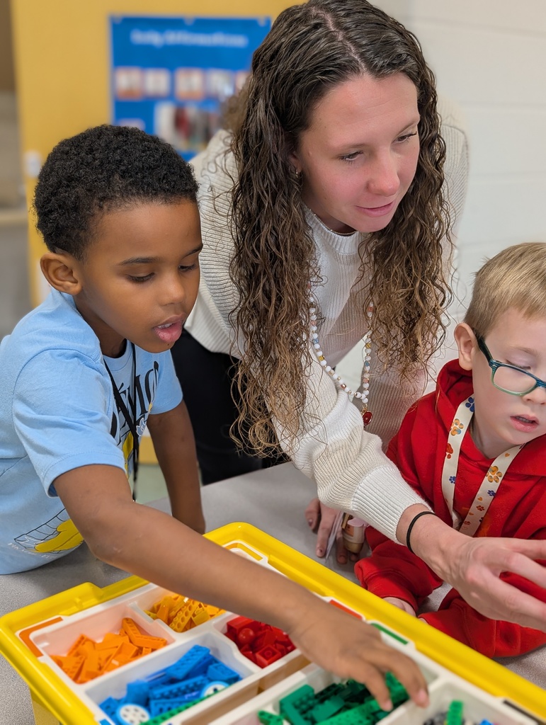 Kindergarten students building a Lego car to measure and then measure the distance it will travel at varying speeds.